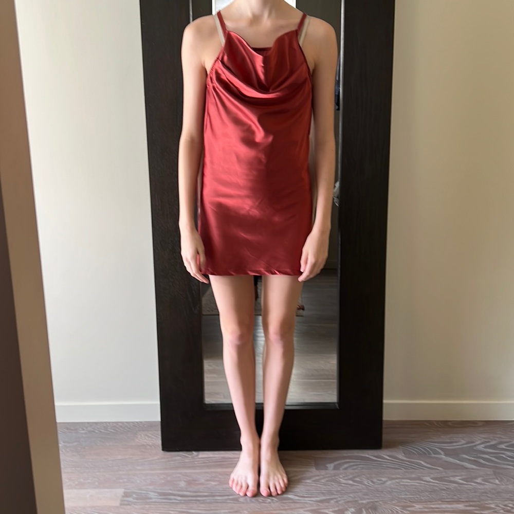 Contemporary costume in satin with rhinestone edging